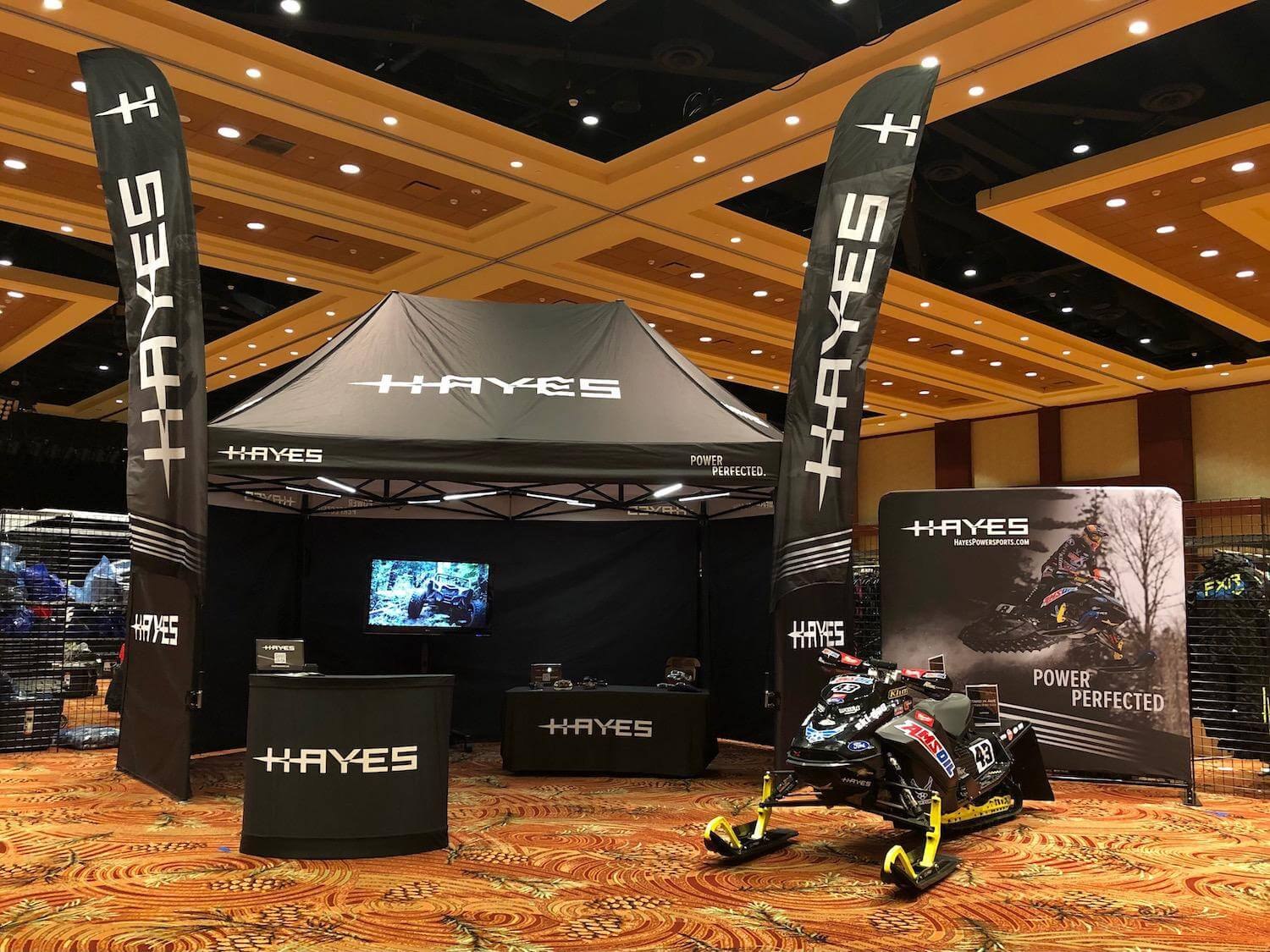 Custom branded tent on display at an indoor event