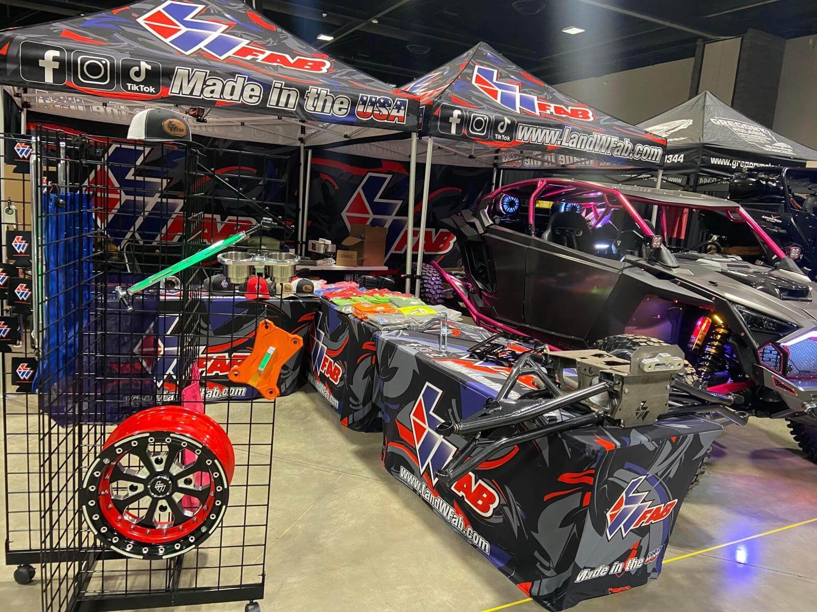 Colorful custom tents at a motorsports event